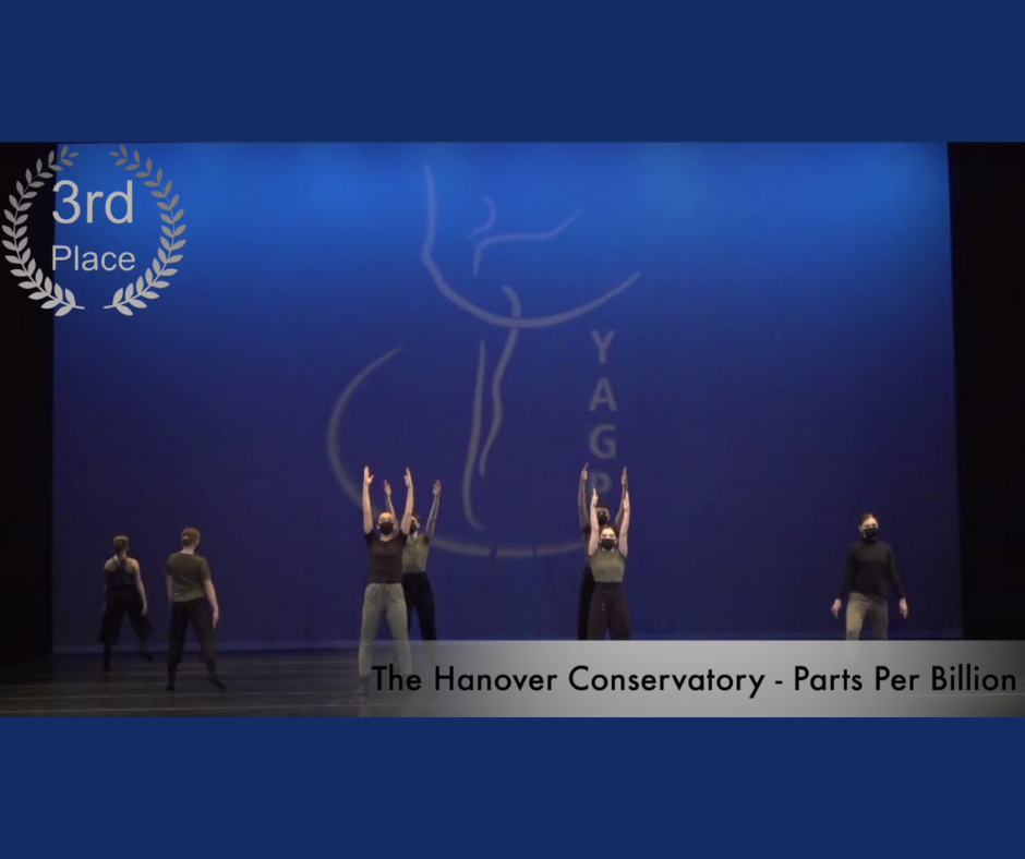 Color photograph of the YAGP stage as the dancers perform the ensemble piece. They are dressed in black and grey. The four dancers in the middle stand with their arms straight over their head. There is a 3rd Place insignia over the top left of the photo and the bottom reads "The Hanover Conservatory - Parts Per Billion".