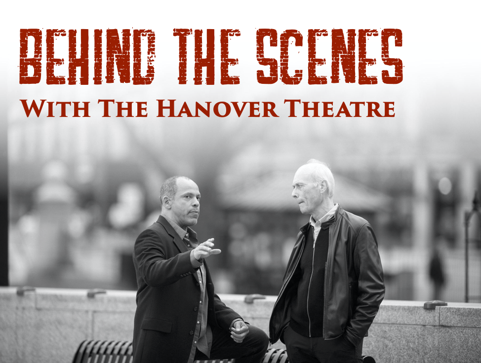 Black and white photo of Joshua and Dale conversing on the Worcester Common. Red text on the photo reads "Behind the Scenes with The Hanover Theatre".