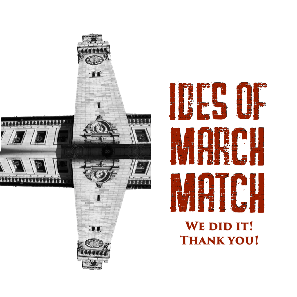 Black and white image of Worcester City Hall's clock tower, reflected horizontally. The text on the image is red and reads, "Ides of March Match," and then in smaller red letters "We did it! Thank you!"