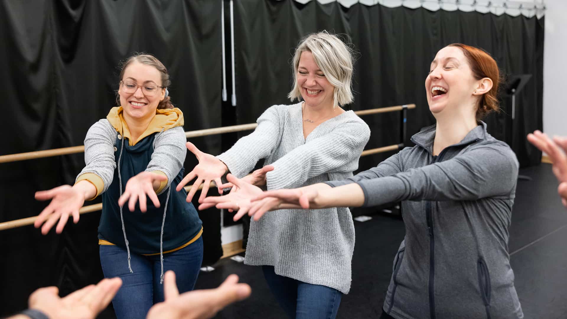 adults during an acting exercise