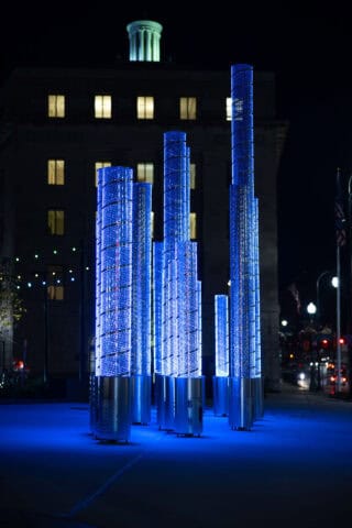 Francis R. Carroll Plaza art installation shining with blue lights. Photo by Unity Mike Photography.