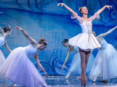 Delaney Washington as the Snow Queen with Corps de Ballet in The Nutcracker 2025 at The Hanover Theatre. Photo by Mike Nyman.