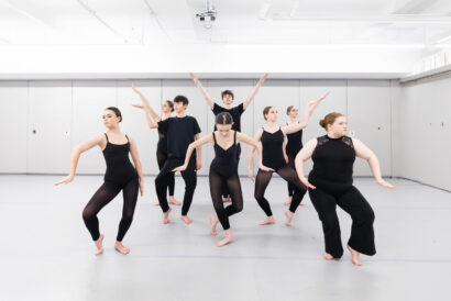 Performance Development Company Level 1 - Hanover Theatre and Conservatory Group of ballet dancers in black leotards posing in a bright dance studio.